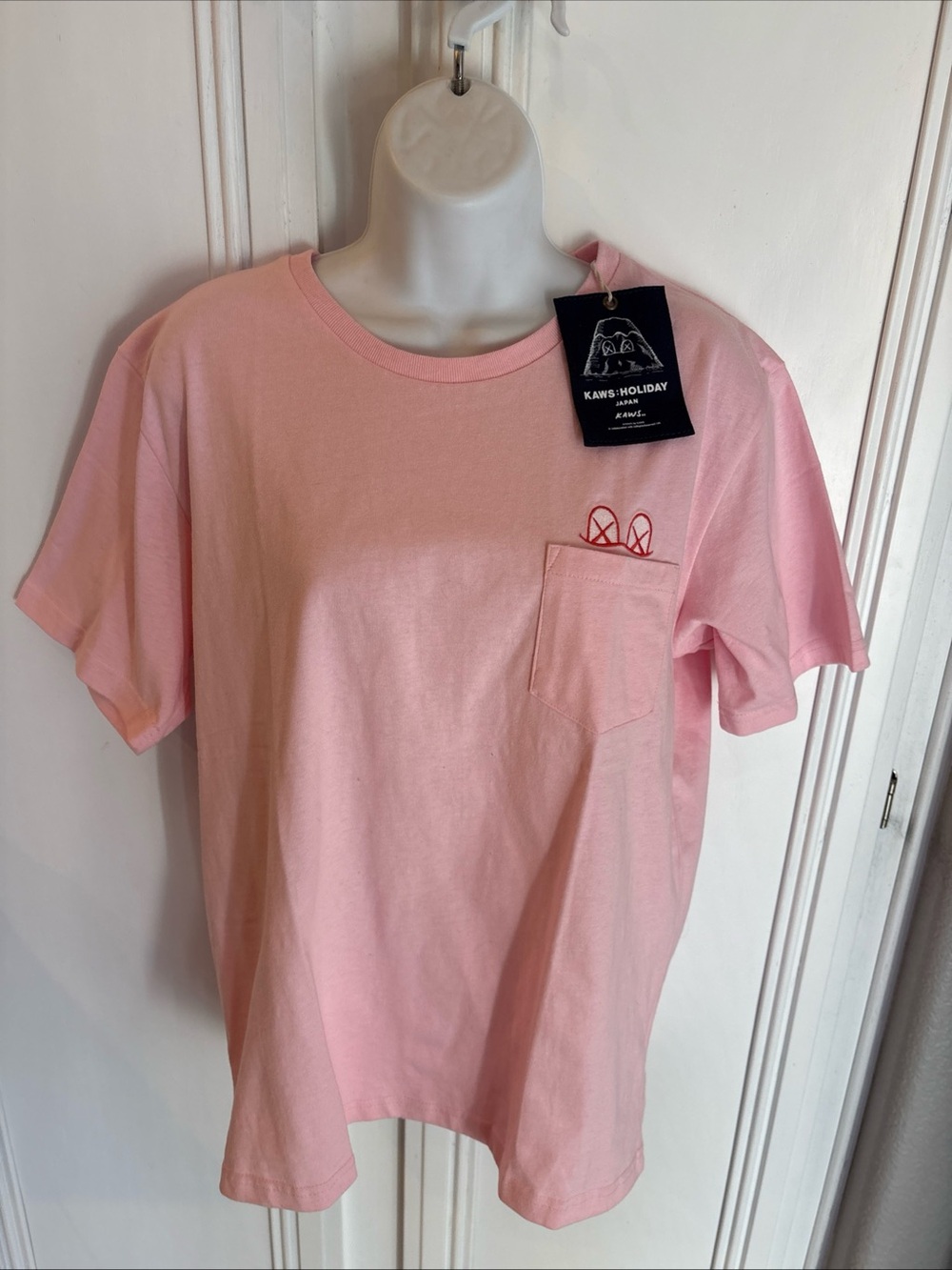NWT Kaws Holiday Japan Pocket Tee Shirt Pink Size Large Authentic Sticker cotton